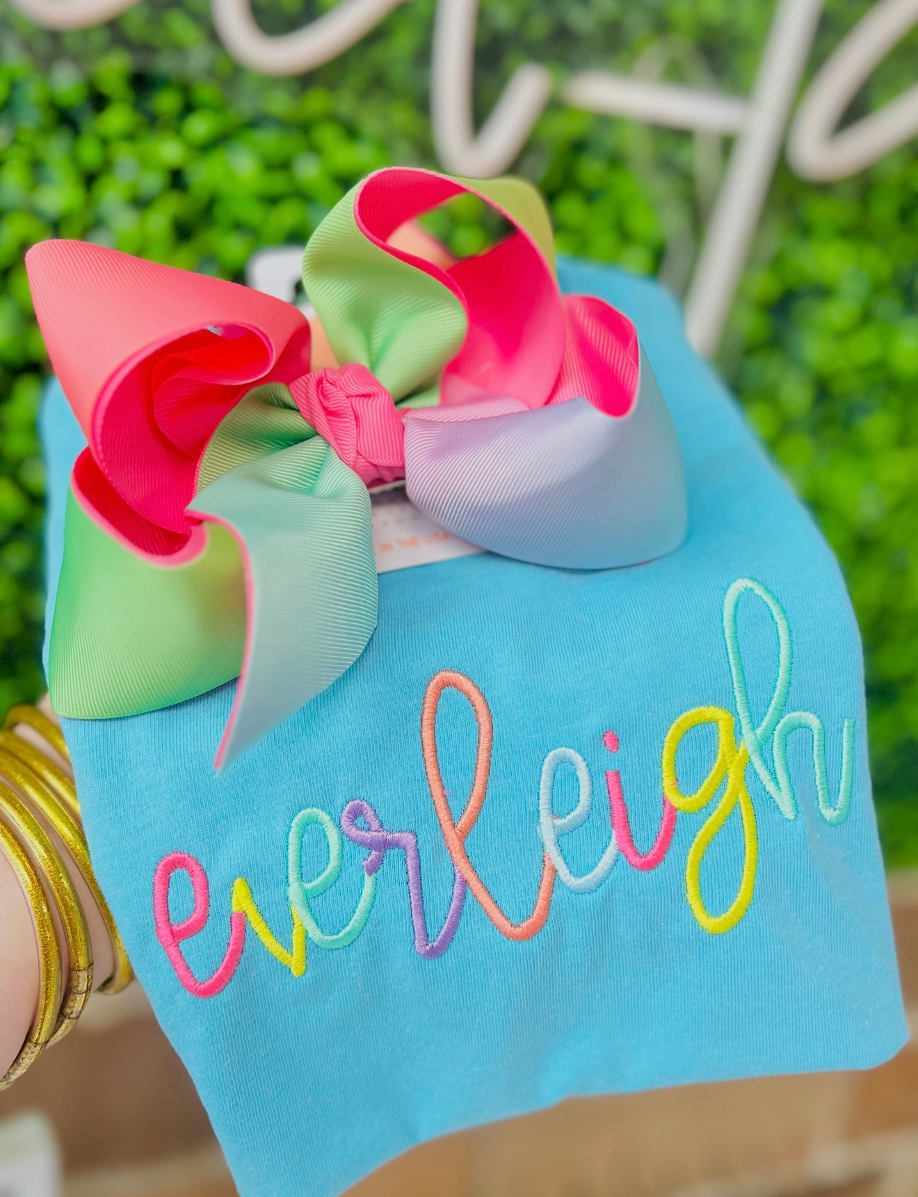 Rainbow stitched mystery tee