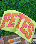 Bright and sunny varsity tee