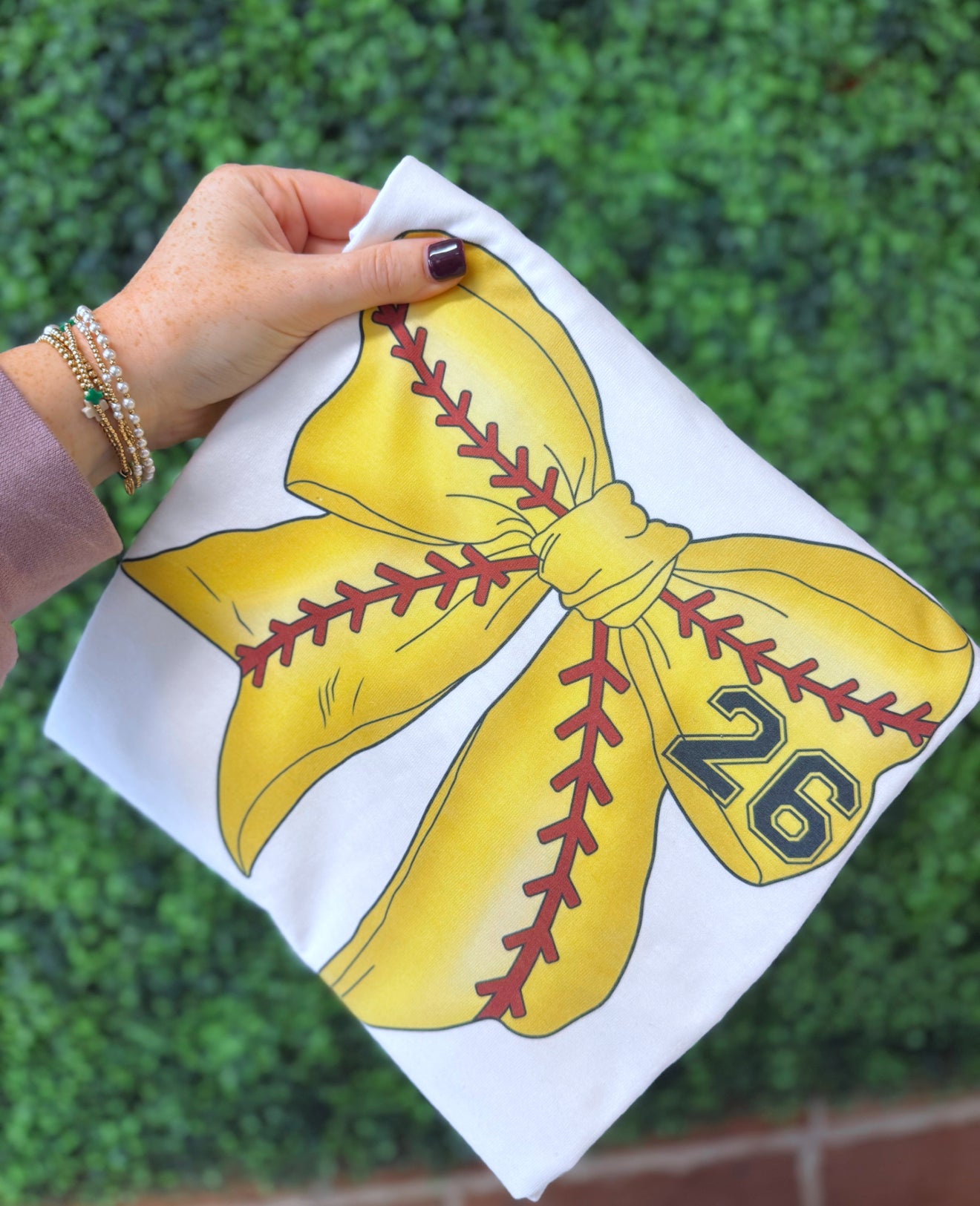 Sports bow tee