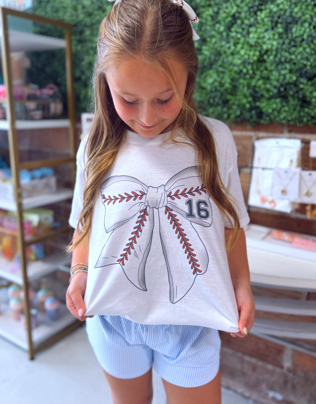 Sports bow tee