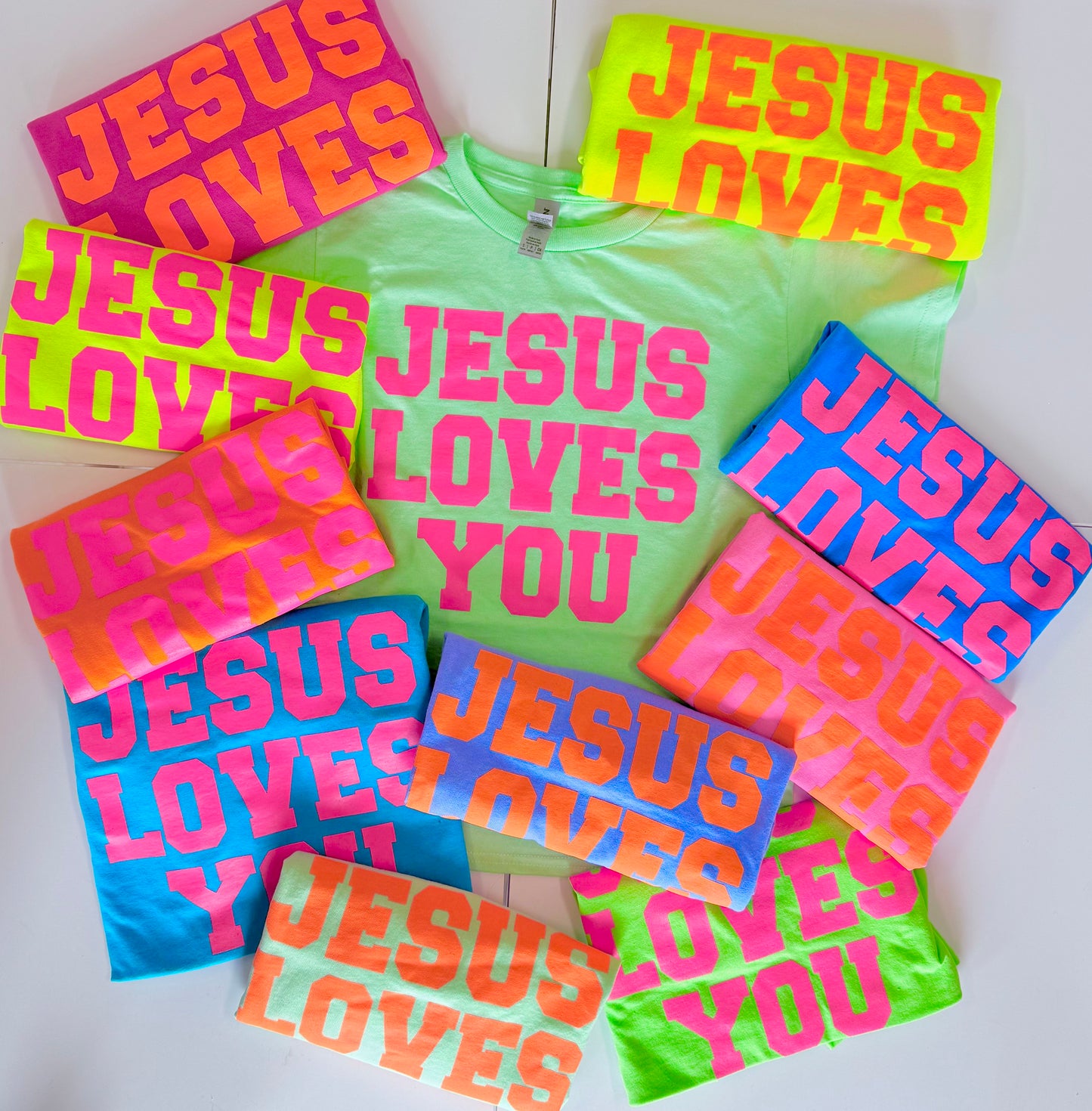 Jesus loves you tee