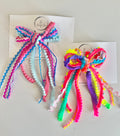 She used to tie her hair in ribbons and bows clip
