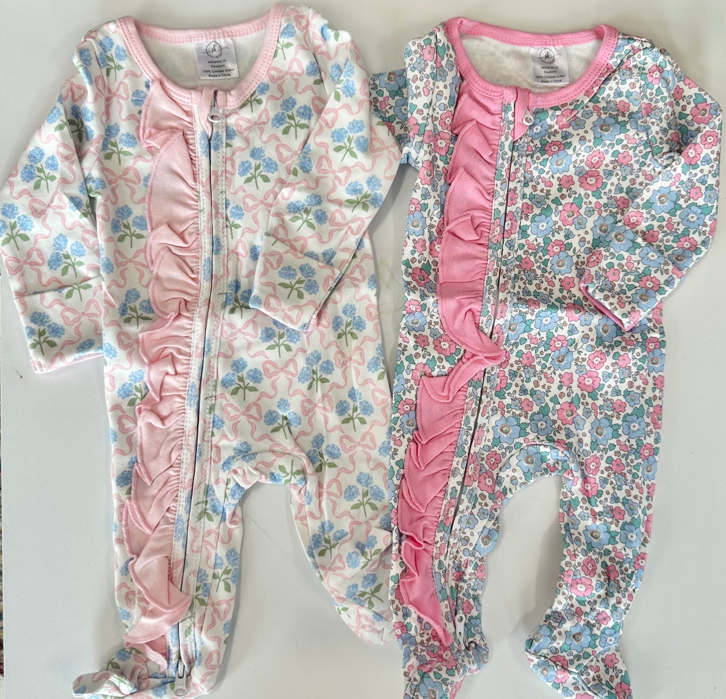 Floral ruffle zip footie