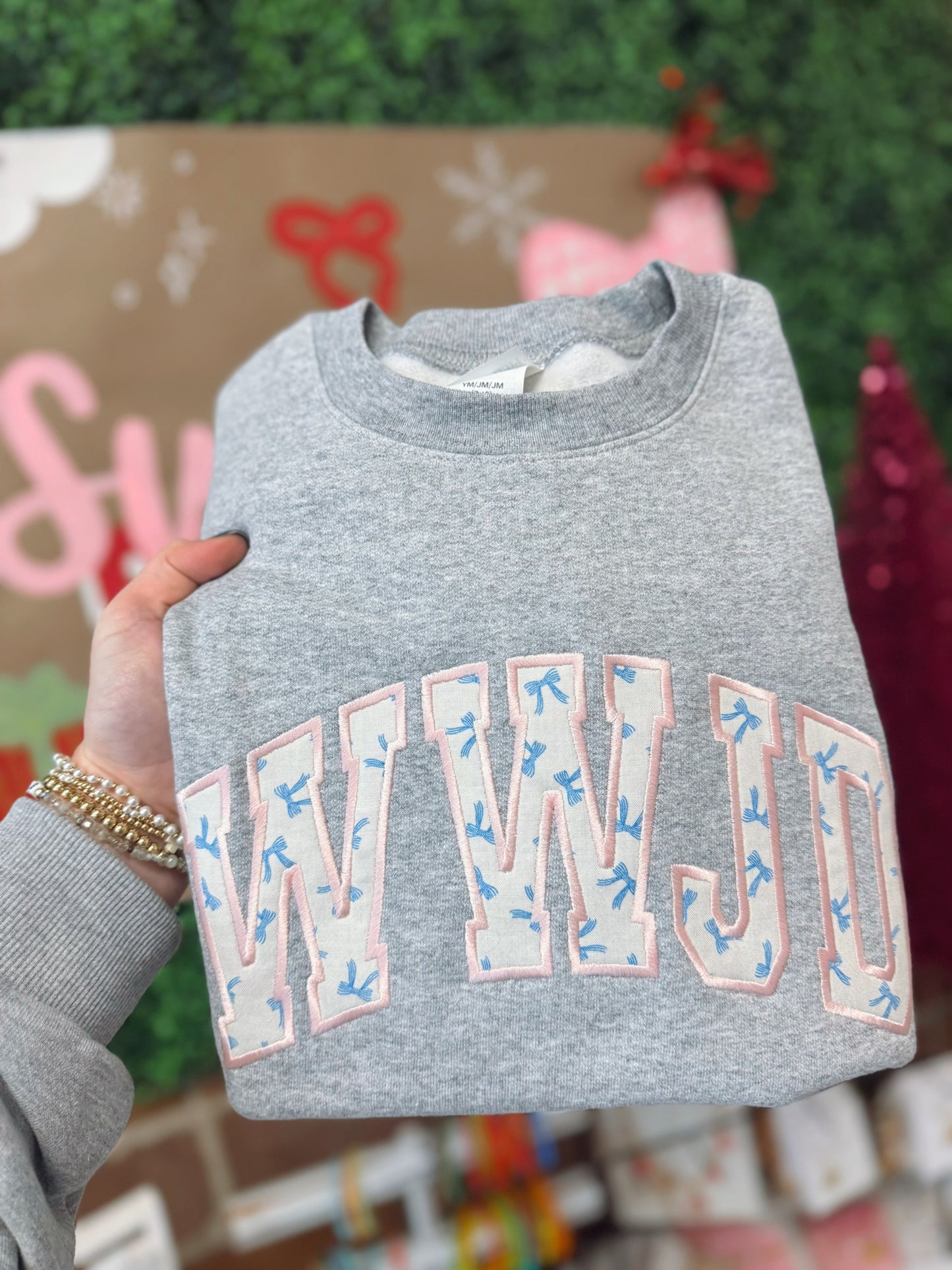 WWJD blue bow with pink stitch Sweatshirt